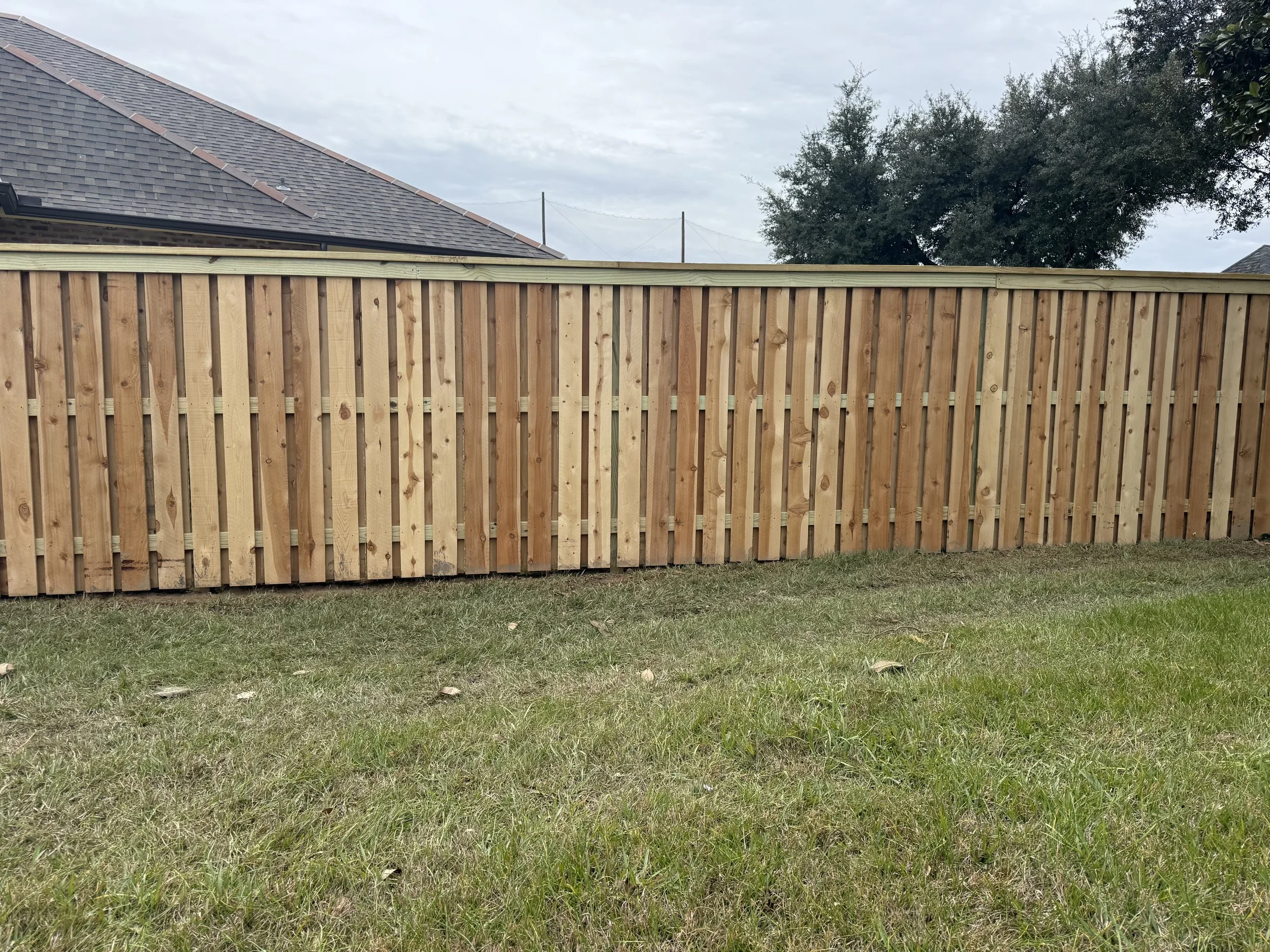 Cedar shadowbox fence installation in Baton Rouge LA
