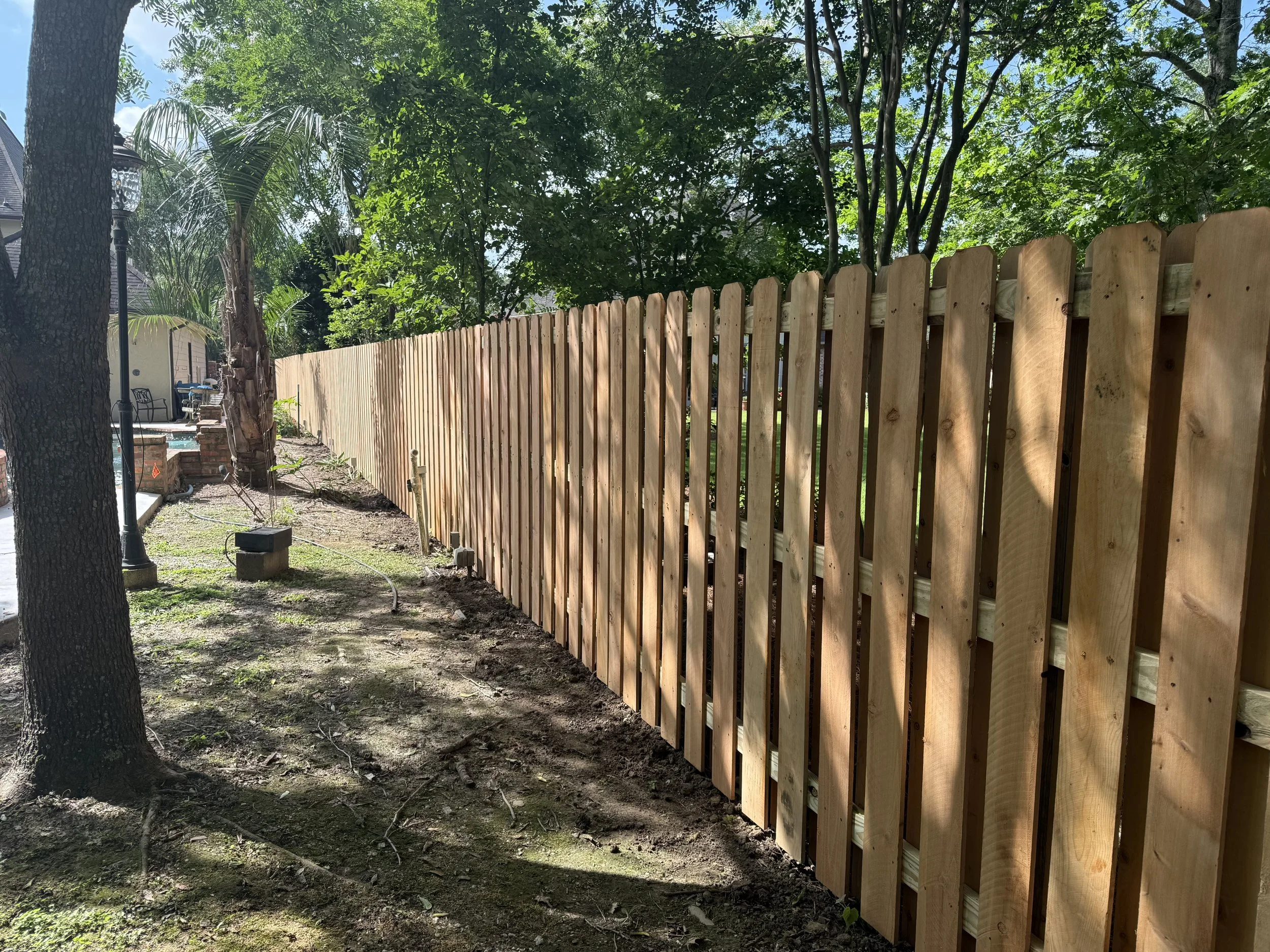 Cedar shadowbox fence installation in Baton Rouge LA