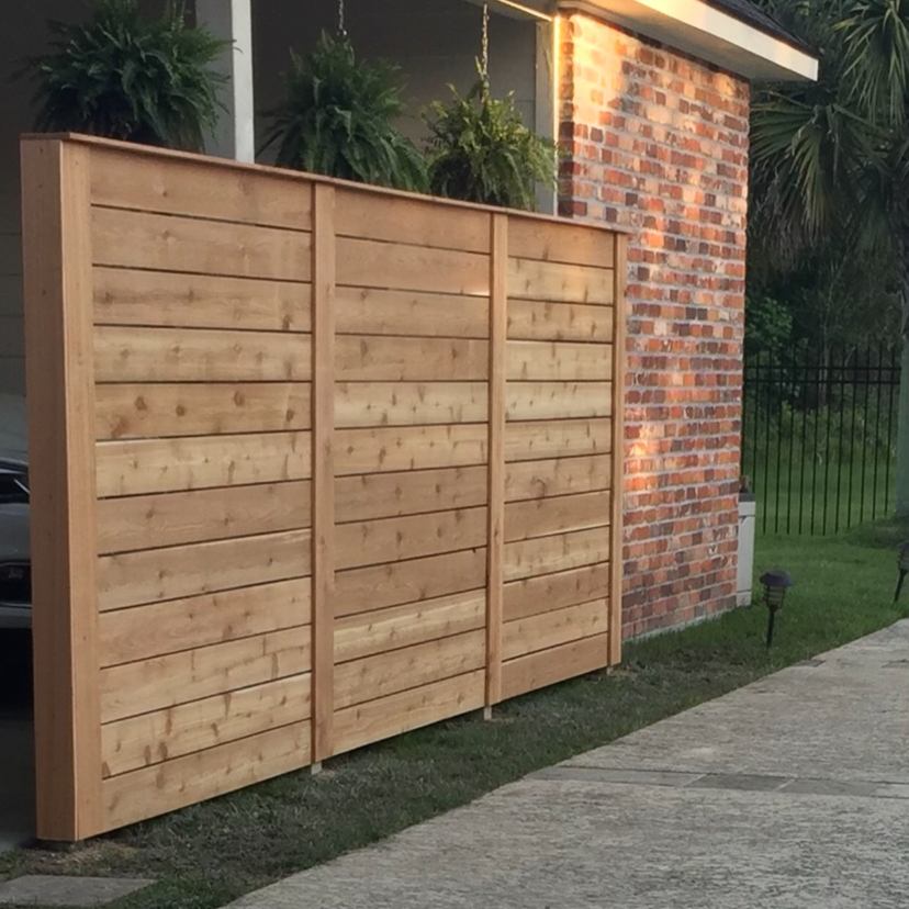 Horizontal wood fence built for backyard privacy in Gonzales LA