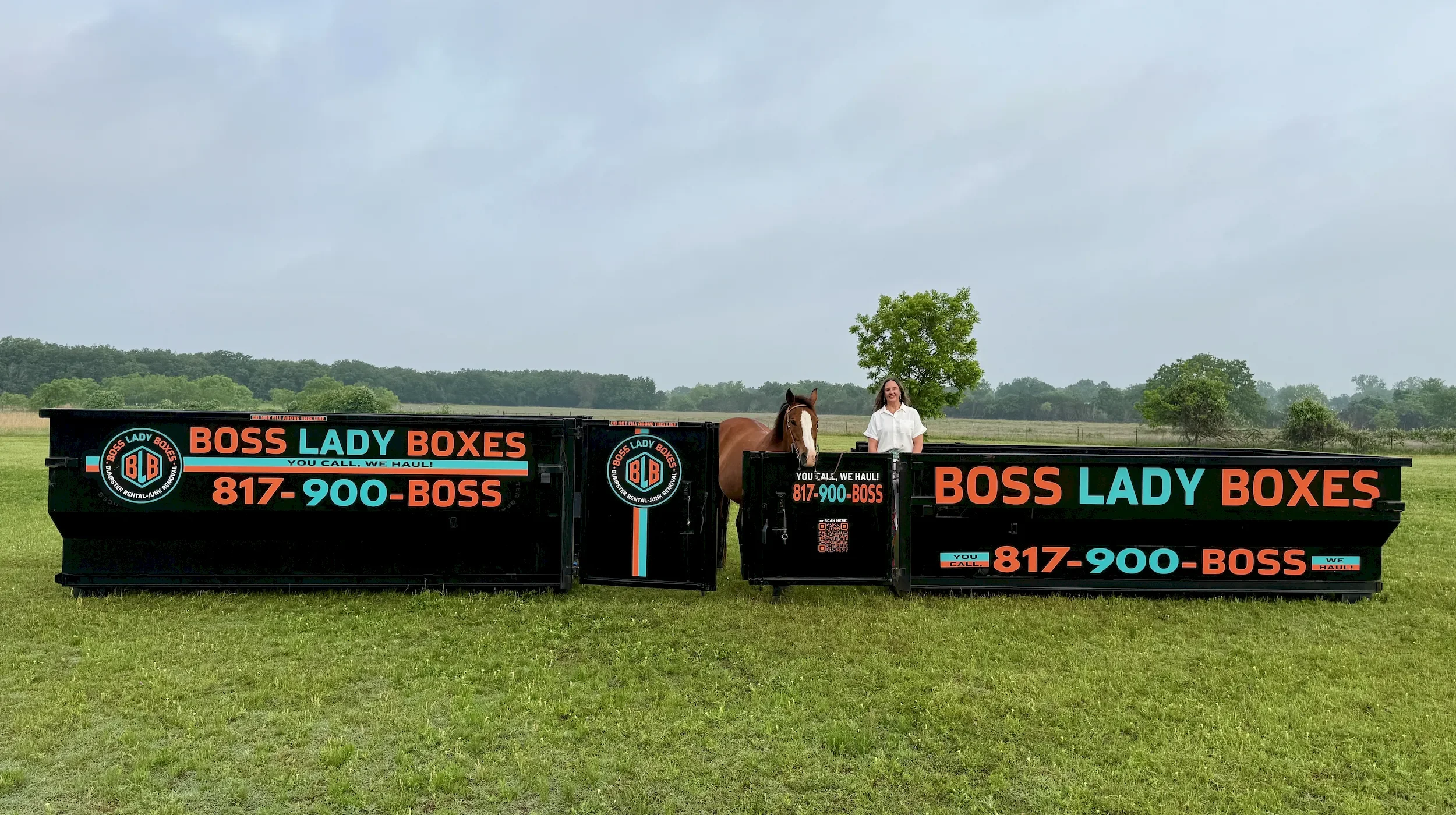 Boss Lady Boxes owner Michelle Lozier with Oakley the horse between 17-yard and 14-yard dumpsters for dumpster rental and junk removal in Glen Rose, Texas.