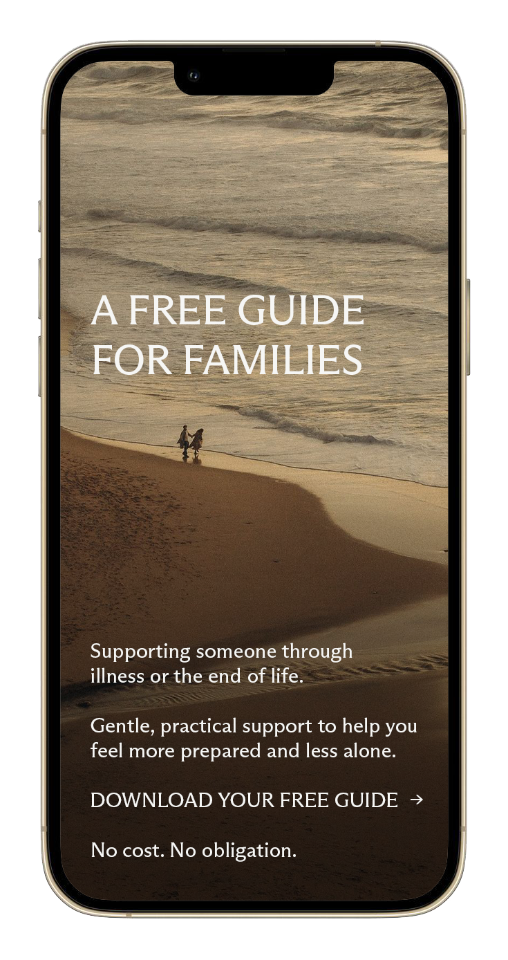 Smartphone screen displaying a guide titled 'A Free Guide for Families' with a background of a beach scene and two people walking along the shore.