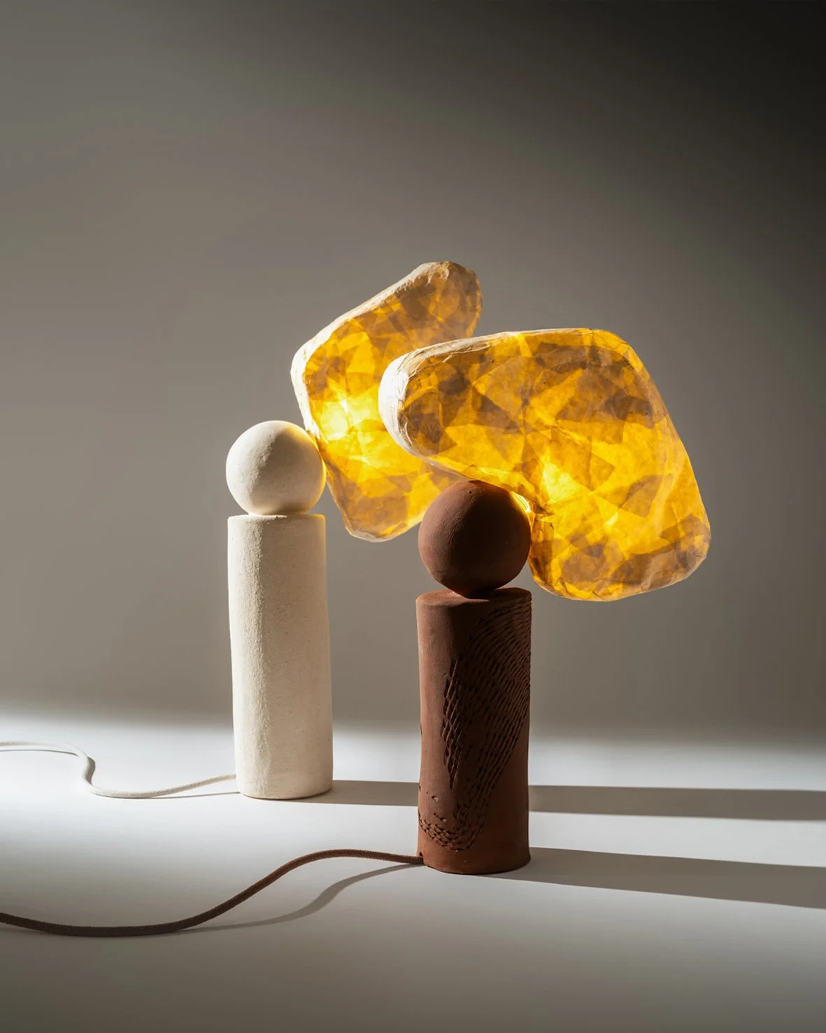 raīz unique objects one of a kind lamp. BARANSU handmade terracotta and white clay table lamps with japanese handcrafted shades, created using traditional techniques and natural materials.