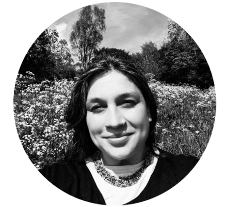 Black and white image of Rekha Godbole's face in a circular frame
