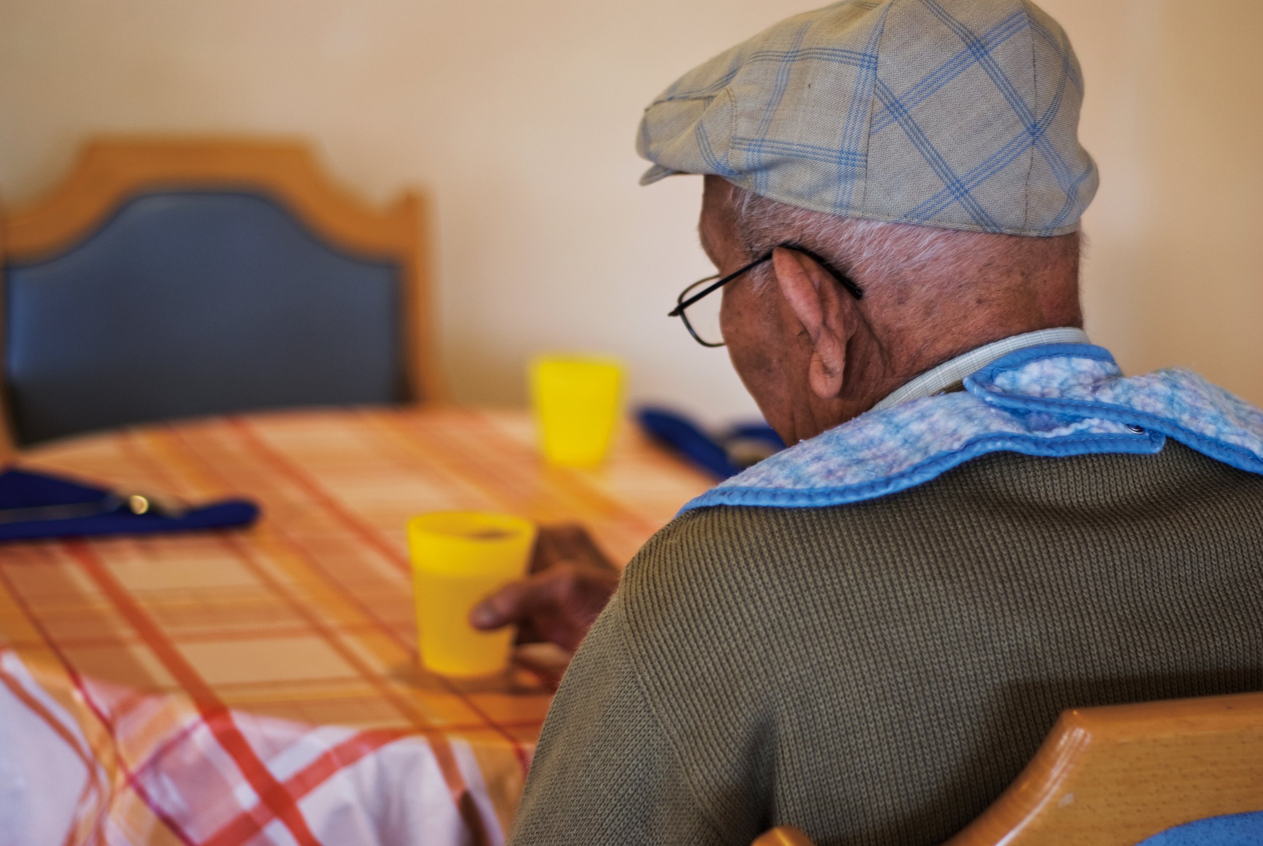 elderly man featured in branding identity for a photographer art therapist consultant