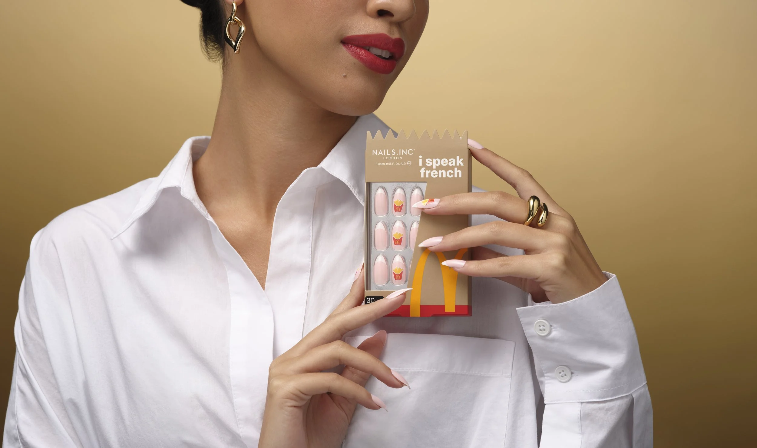 NAILSINC_SS24_COLLABS_MCDONALDS_HANDSHOT_ISPEAKFRENCH_PRESSONNAILS_EXT.jpg