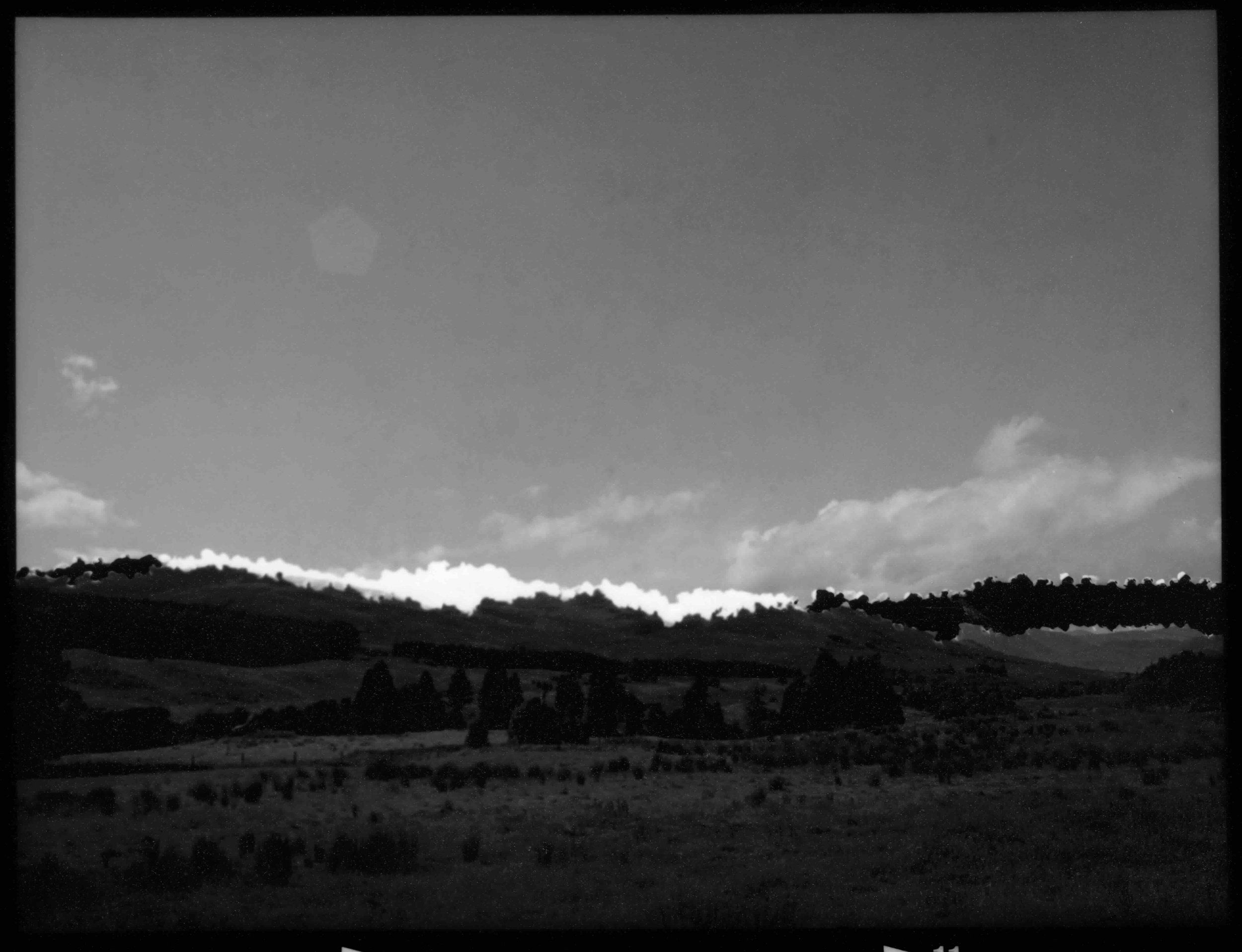‘En Coulisse no.2', black and white photograph from torn and re-arranged negative, 11 x 9 cm, 2026