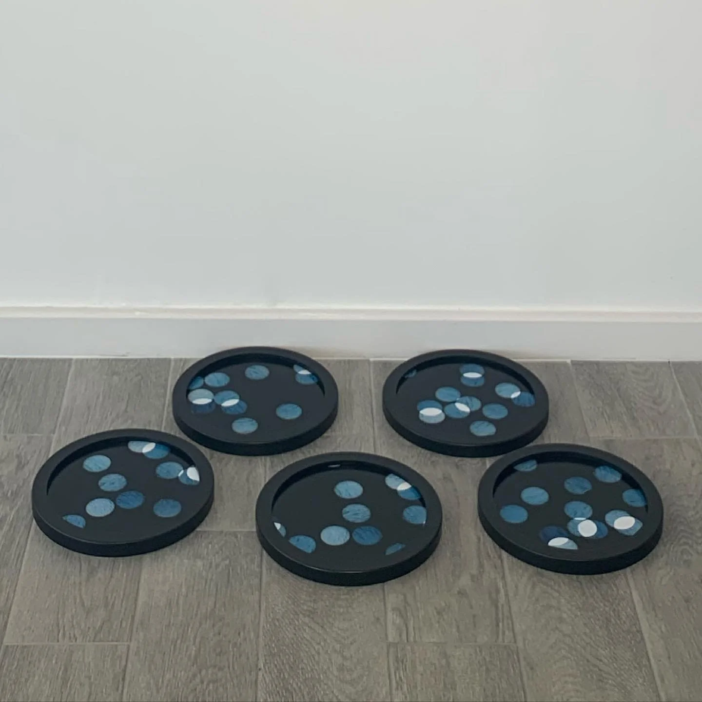 ‘Pieces of Water', five circular framed unique photographs from negative confetti, 24 cm  diameter, 2020