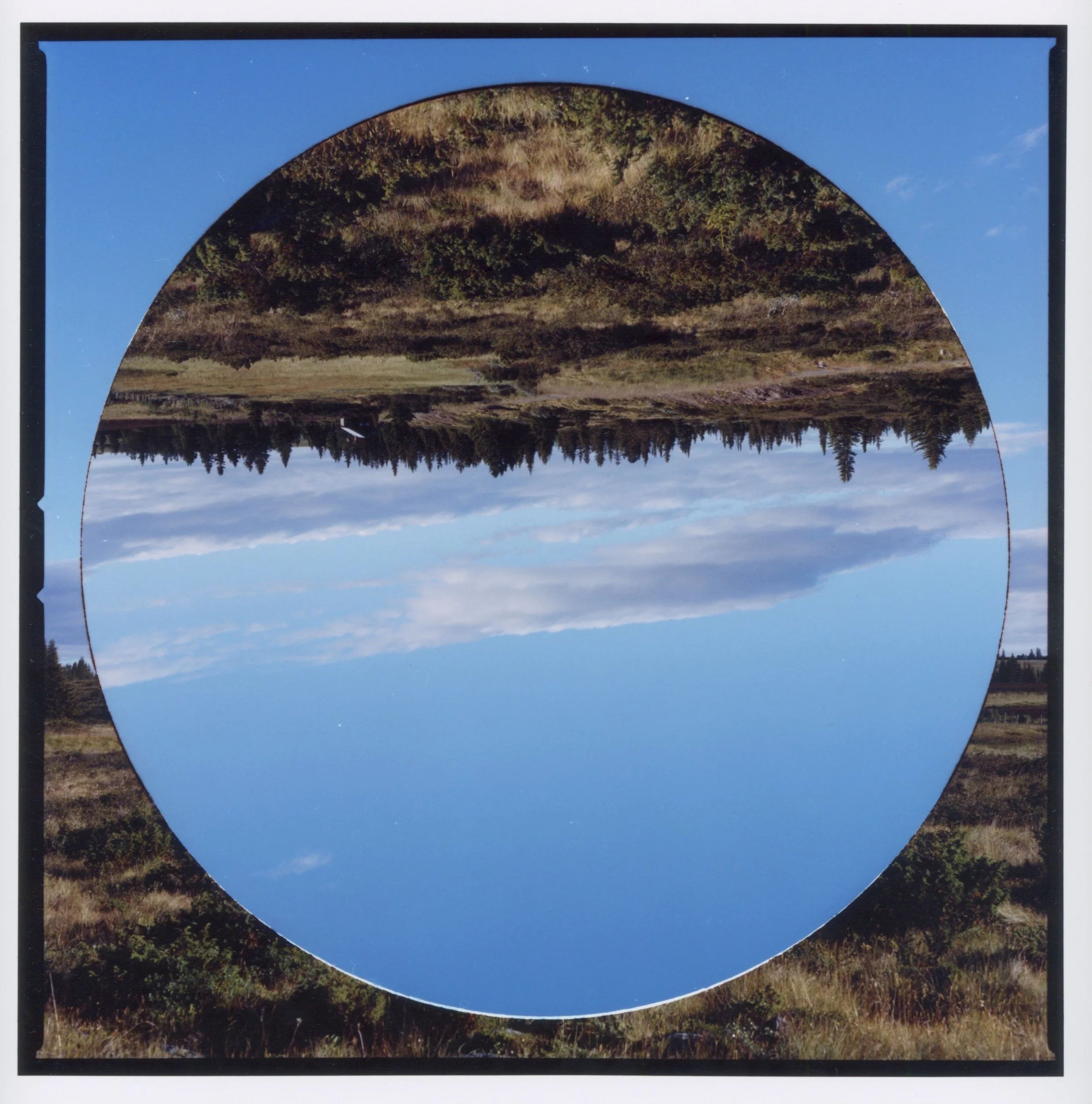 ‘In the beginning...', colour photograph from hole-punched and repositioned negative, 24 x 24 cm, 2022