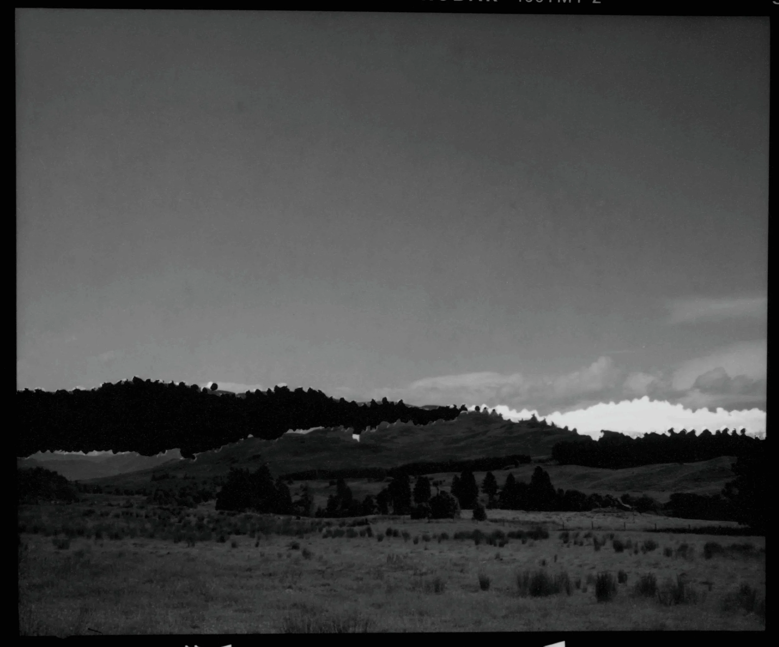 ‘En Coulisse no.1', black and white photograph from torn and re-arranged negative, 11 x 9 cm, 2026
