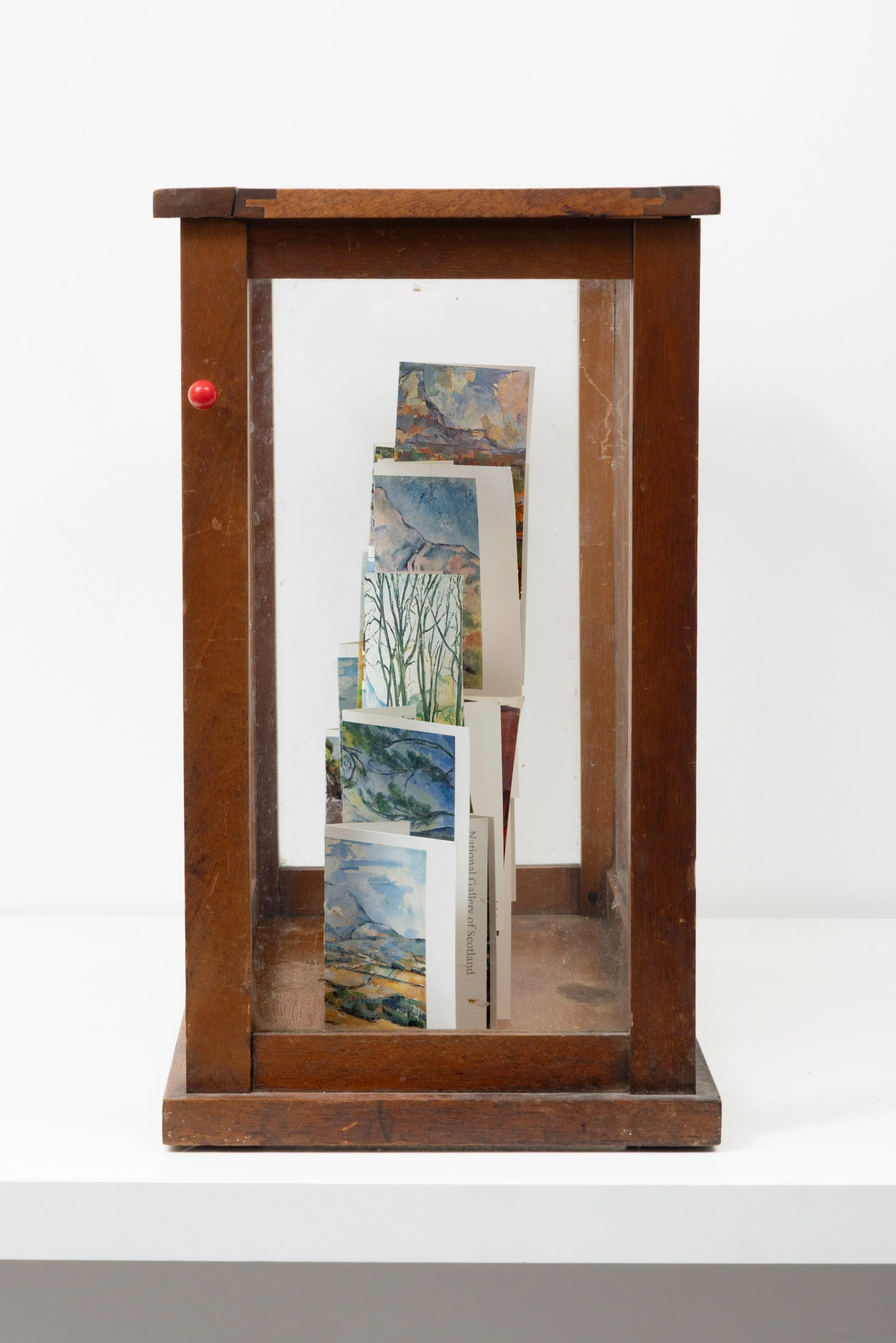 ‘Build me a mountain… (after Cézanne)’, postcards and vintage vitrine, 45 x 40 x 23 cm, 2025