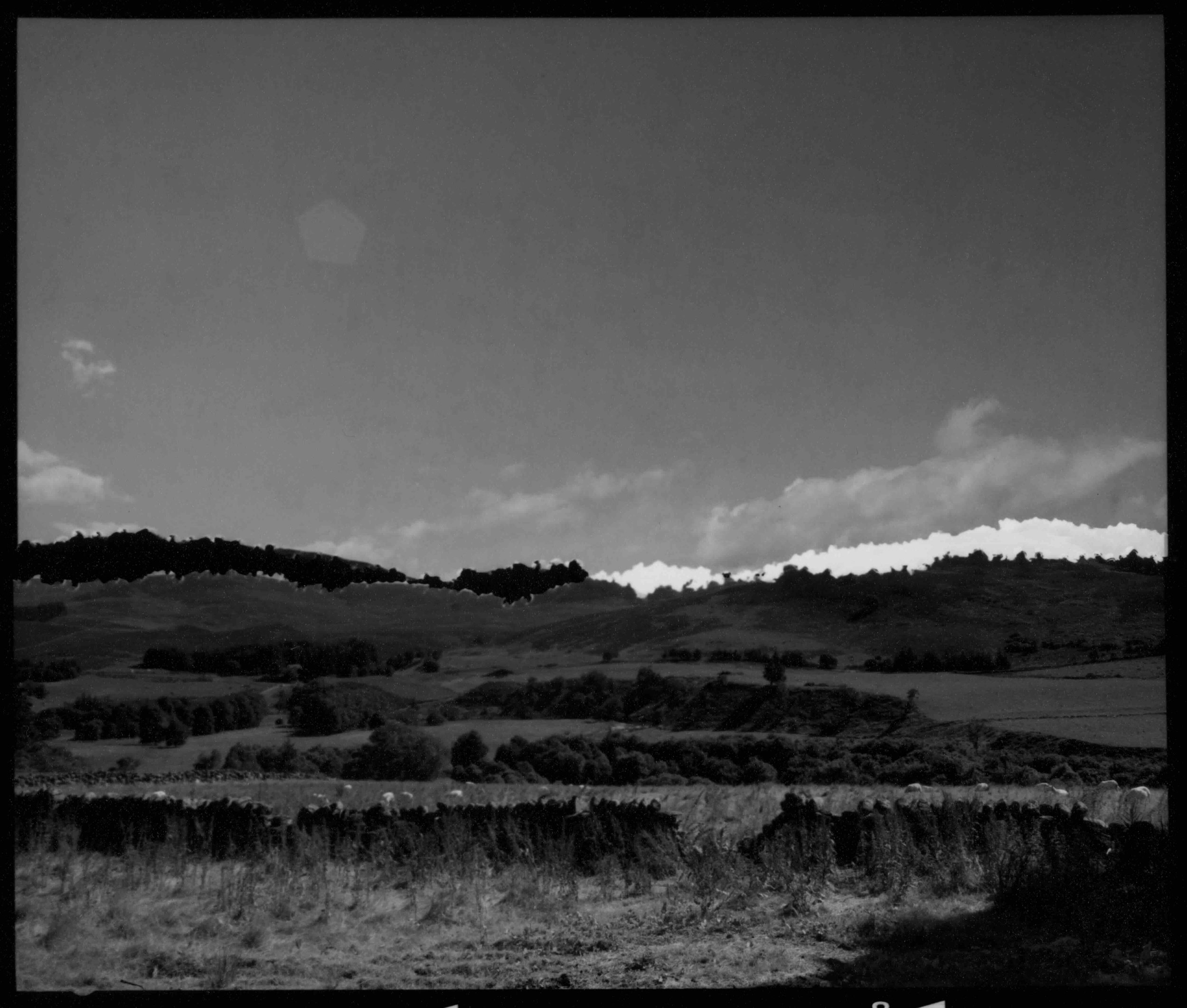 ‘En Coulisse no.4', black and white photograph from torn and re-arranged negative, 11 x 9 cm, 2026