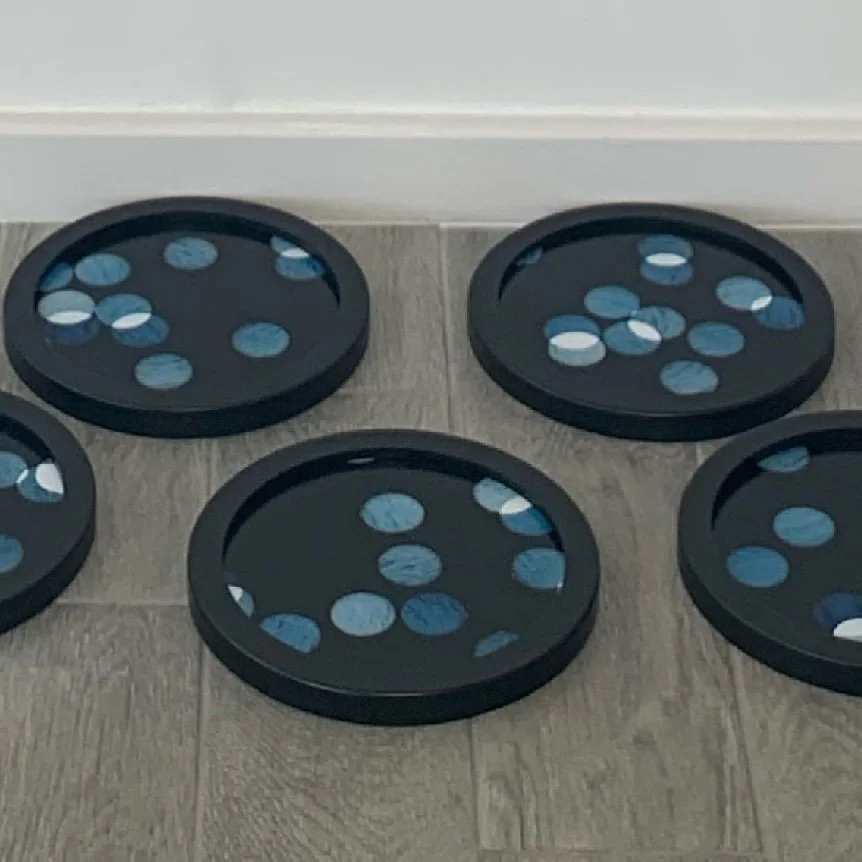 ‘Pieces of Water', five circular framed unique photographs from negative confetti, 24 cm  diameter, 2020