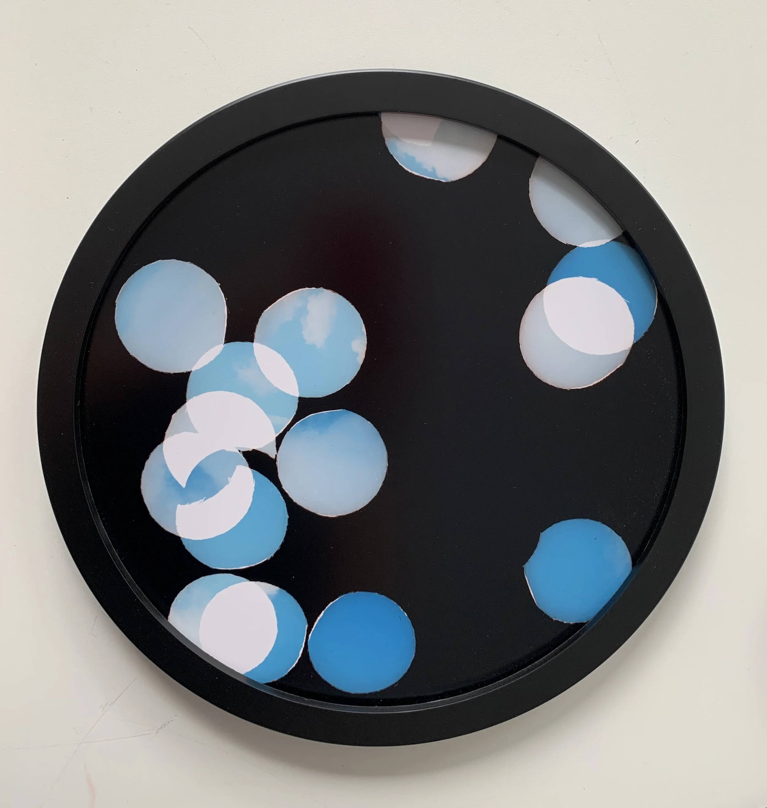 ‘Pieces of Sky', circular framed unique photograph from negative confetti, 24 cm  diameter, 2020