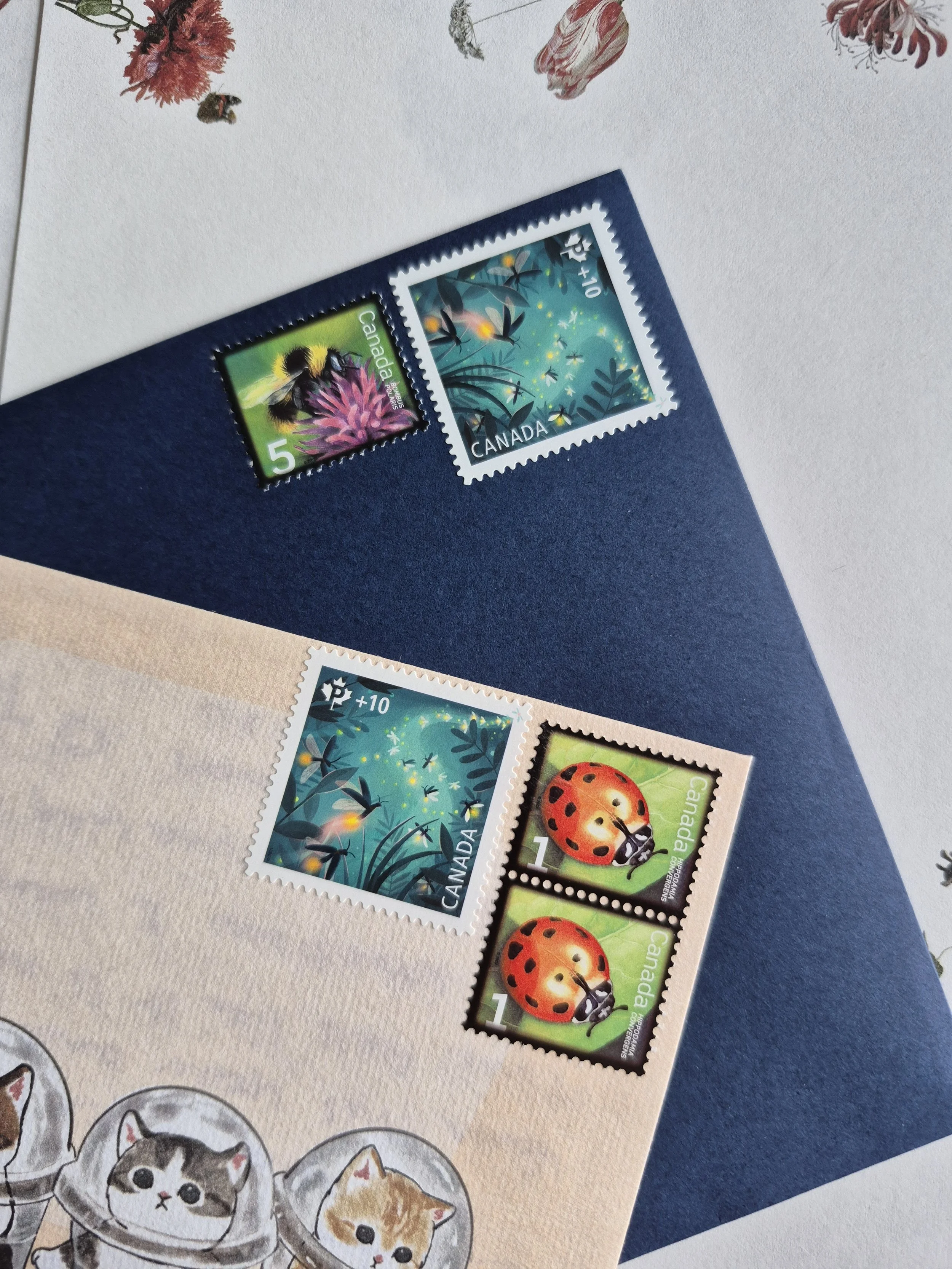 Image of letters with postage stamps ready to mail