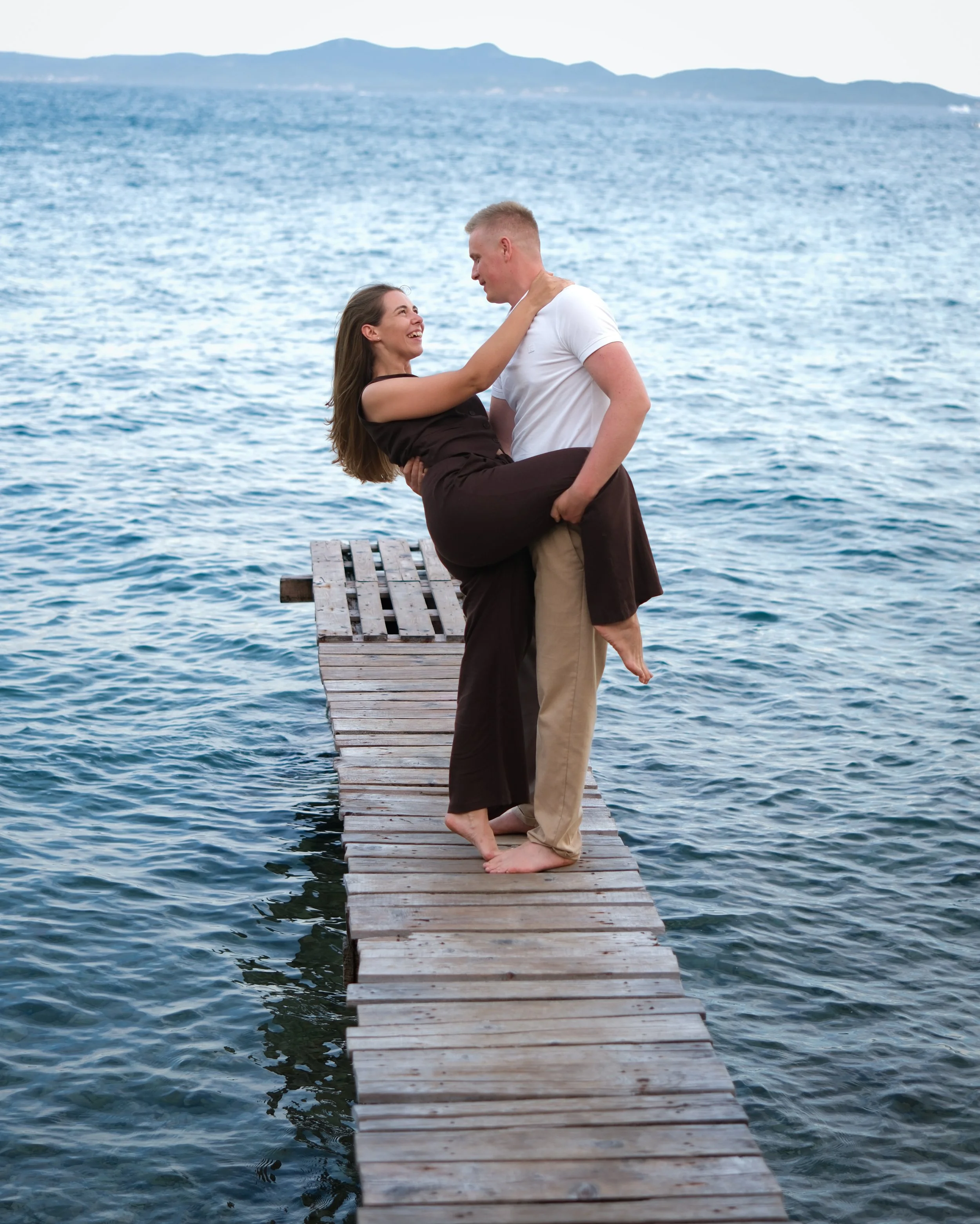 romantic couple by the sea during travel photoshoot in Zadar Croatia