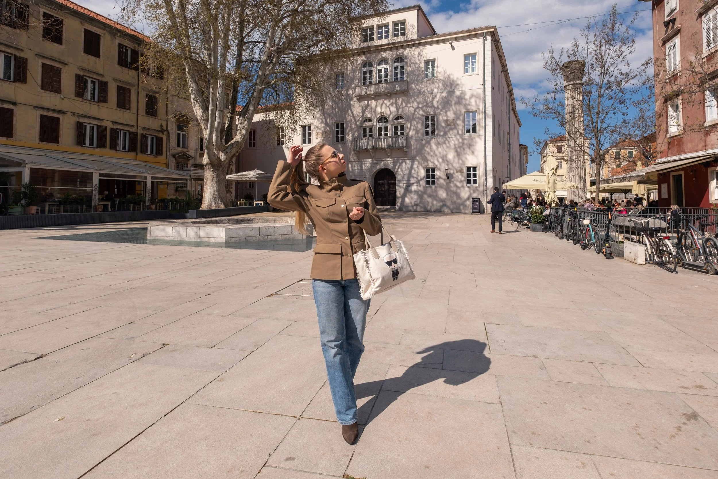 A natural walking photoshoot through the historic streets of Zadar. Movement, architecture, and soft sunlight create dynamic and effortless travel photos. Great for solo travelers and couples exploring the city.