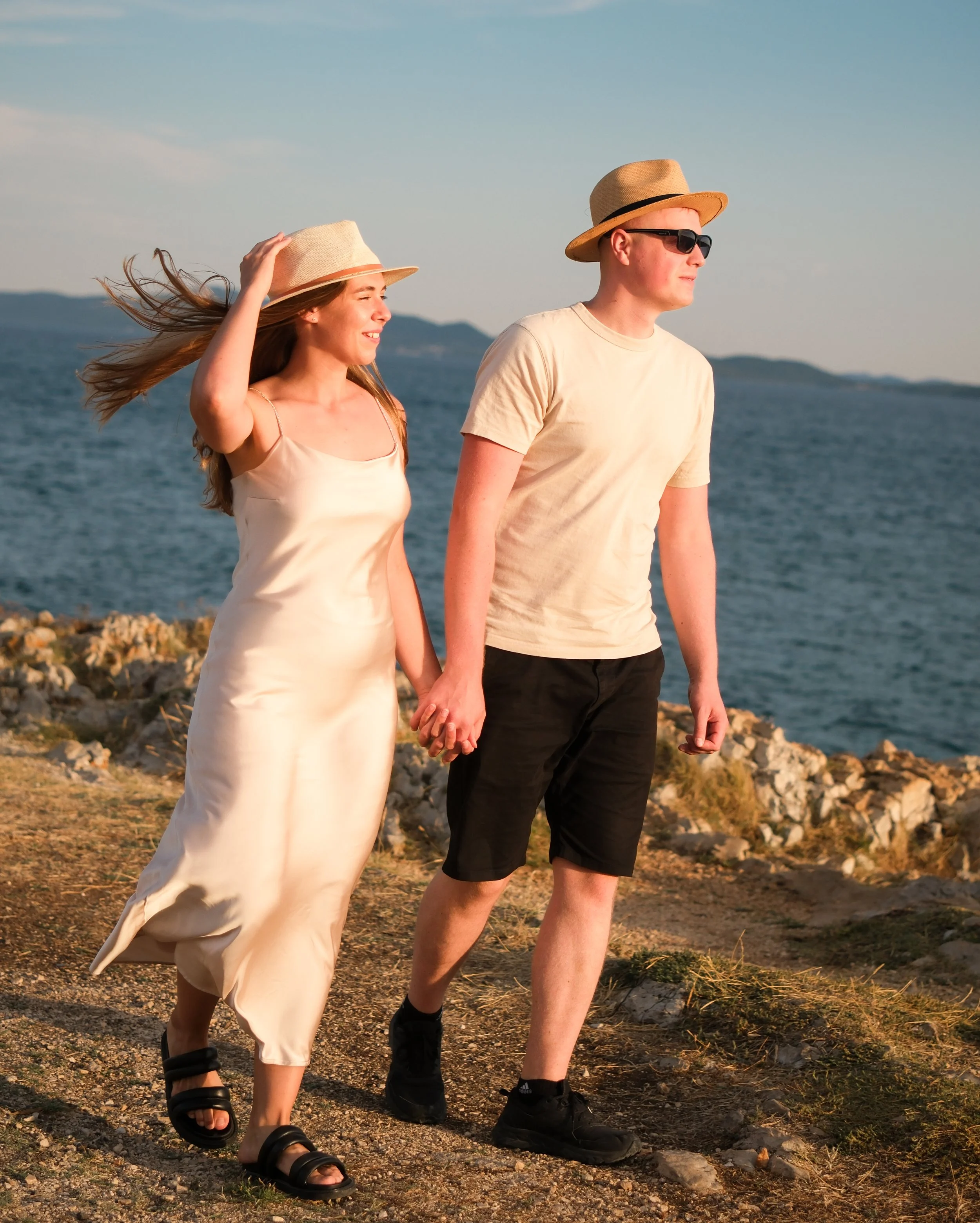 romantic couple by the sea during travel photoshoot in Zadar

