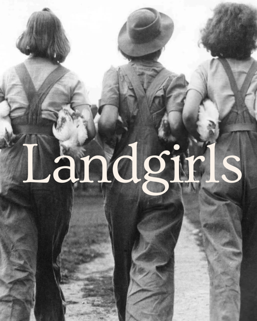 Three young girls in old-fashioned clothing walking away, holding chickens, with the word 'Landgirls' overlayed.