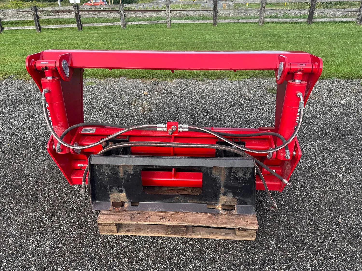 Straight-on rear view showing the frame and quick-attach coupler plate of a 2023 Redrock shear bucket.
