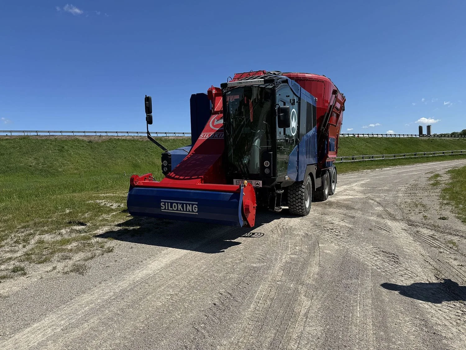 Front perspective view of a used Siloking SelfLine 4.0 self-propelled vertical feed mixer showcasing the heavy-duty silage milling drum intake head.