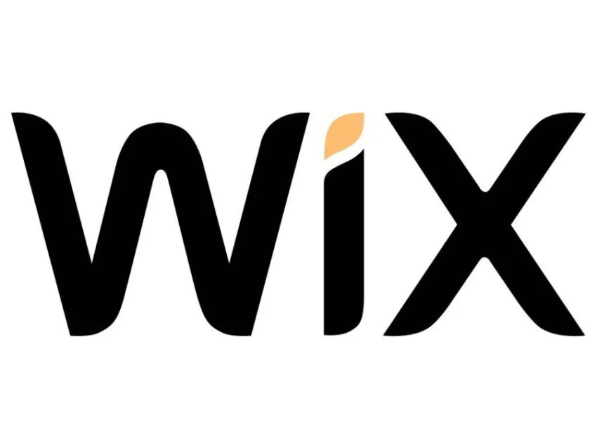 Logo of WIX with a small peach-colored accent on the letter 'i'.