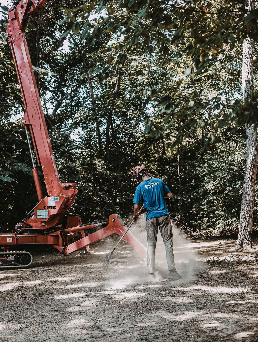 A Quality Tree Surgery Arborist working on a Middle Tennessee Site Raking
