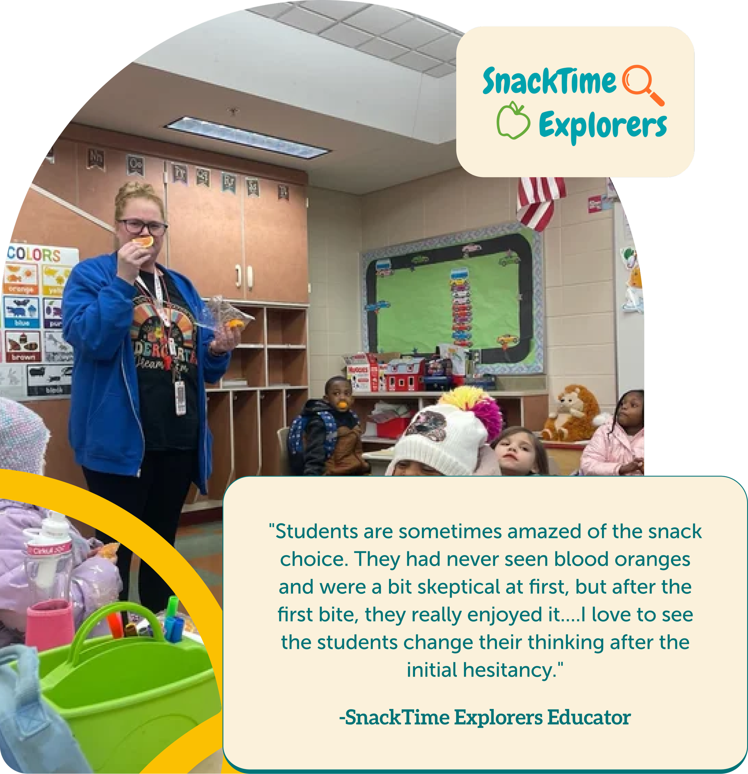 A classroom scene showing a woman in a blue jacket eating an orange snack, with young children sitting at tables. The room has colorful educational posters and toys, including a basket of toy tools. On the wall, there is a logo reading 'SnackTime Explorers' with a magnifying glass and apple icon.