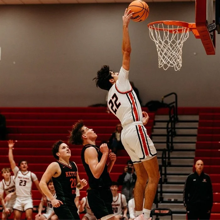 Basketball player dunking