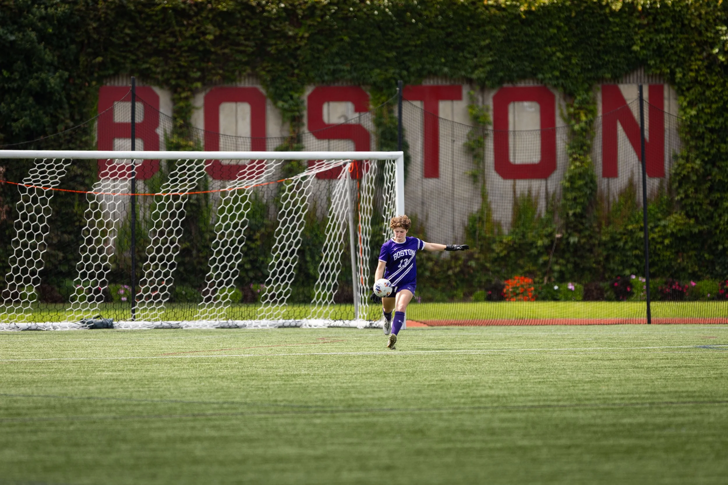 Collegiate soccer goalkeeper during match play