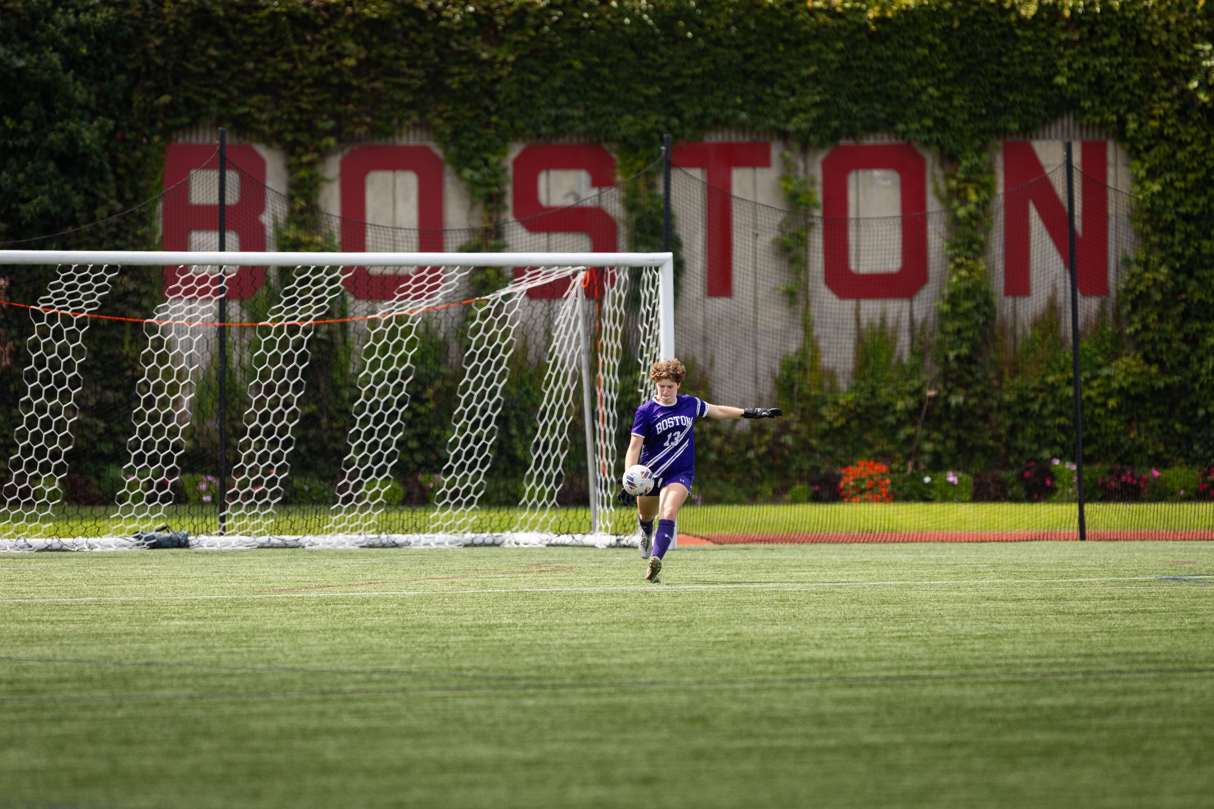 Collegiate soccer goalkeeper during match play