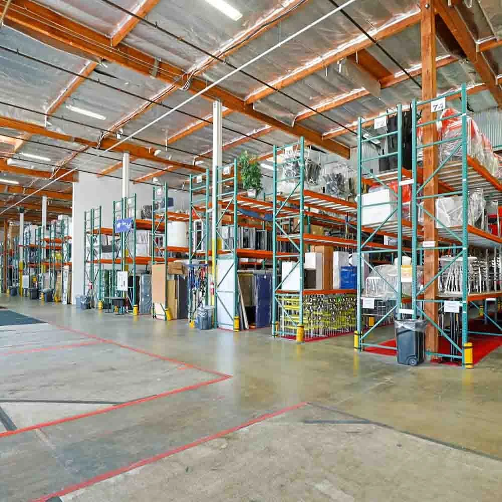 Industrial warehouse operations facility with high ceiling storage and distribution infrastructure