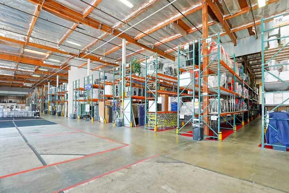 Industrial warehouse interior with racking in an urban infill logistics facility