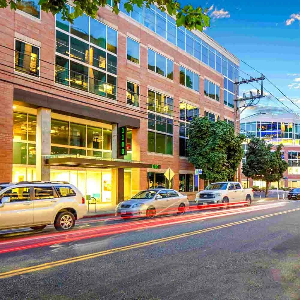 Institutional office building representing real estate capital markets and investment partnerships