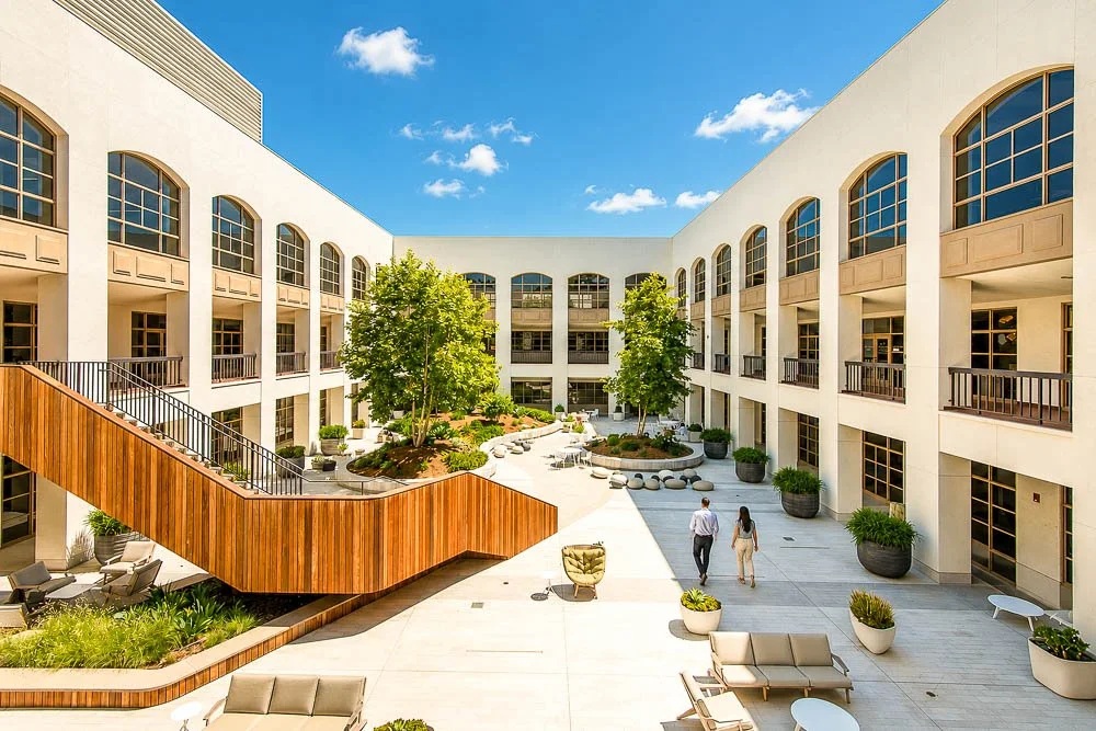 Lifestyle office courtyard environment representing experiential workplace investments by Palisade Group