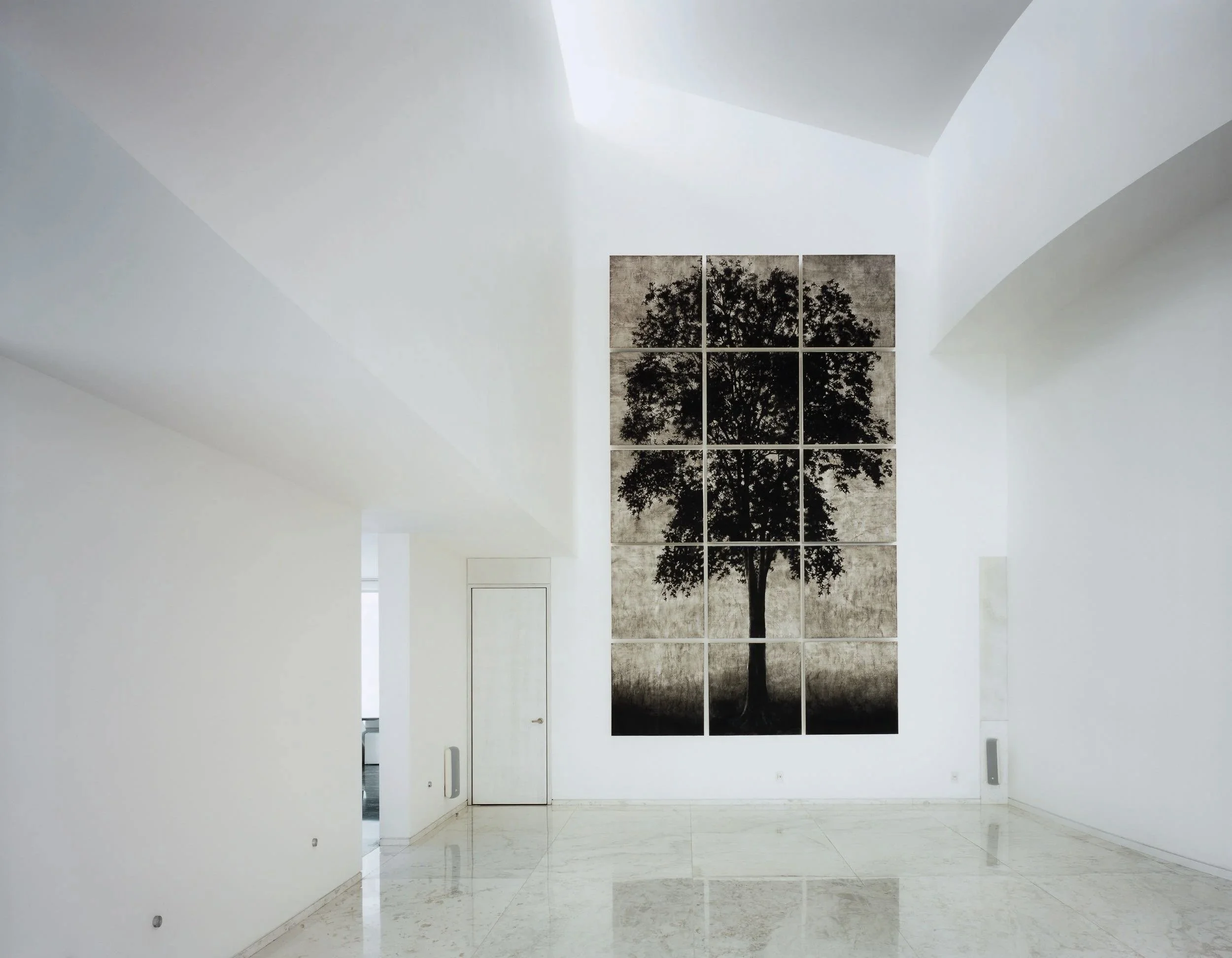 Casa Olivia by Miguel Angel Aragonés: Minimalist residential design focused on the harmony of volume, light, and private silence.