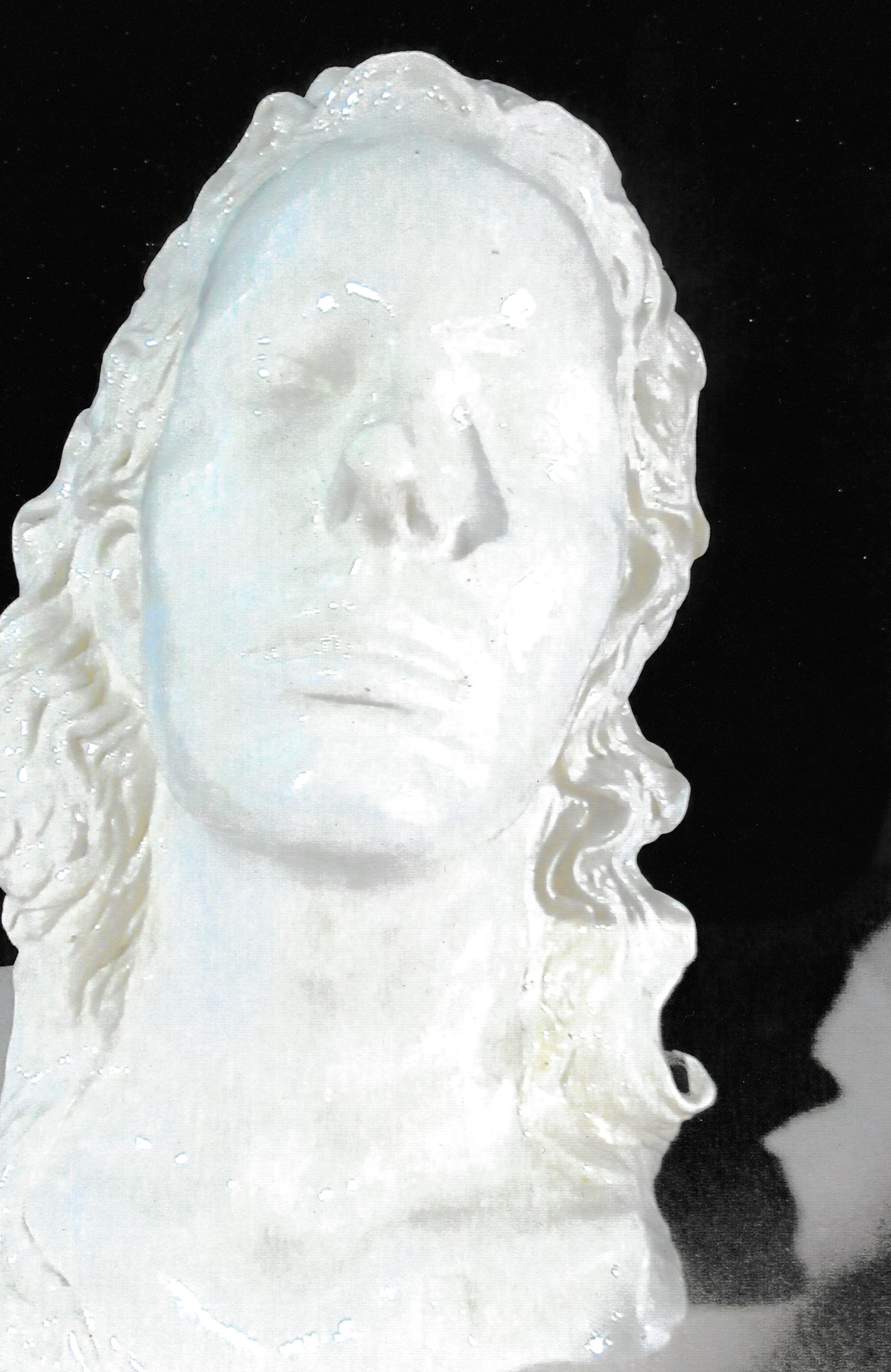 Ceramic life mask bust of a long-haired woman facing forward, her features softly modeled and expression serene.