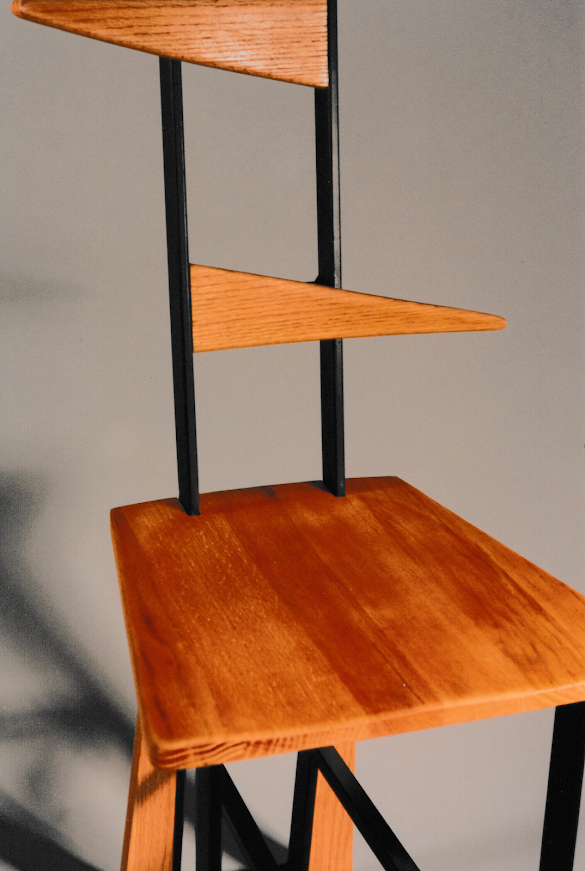 Detail image of stacked wooden shelves integrated into the chair’s back structure