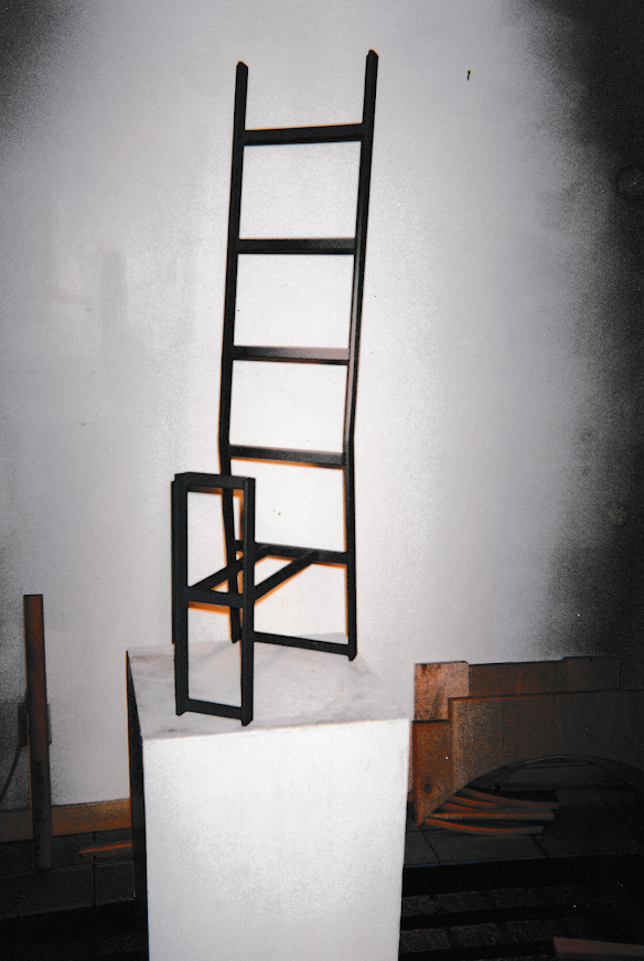 Alternate angle of the same pedestal-mounted chair highlighting the ladder-like back.