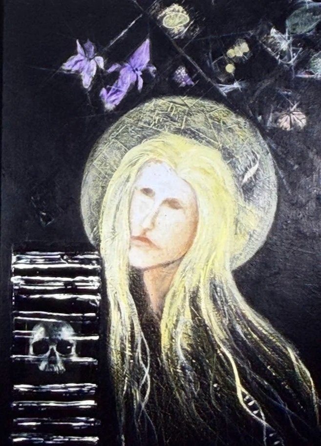 Portrait of a blonde saint with long pale hair surrounded by dark tones, butterflies, and a skull. 