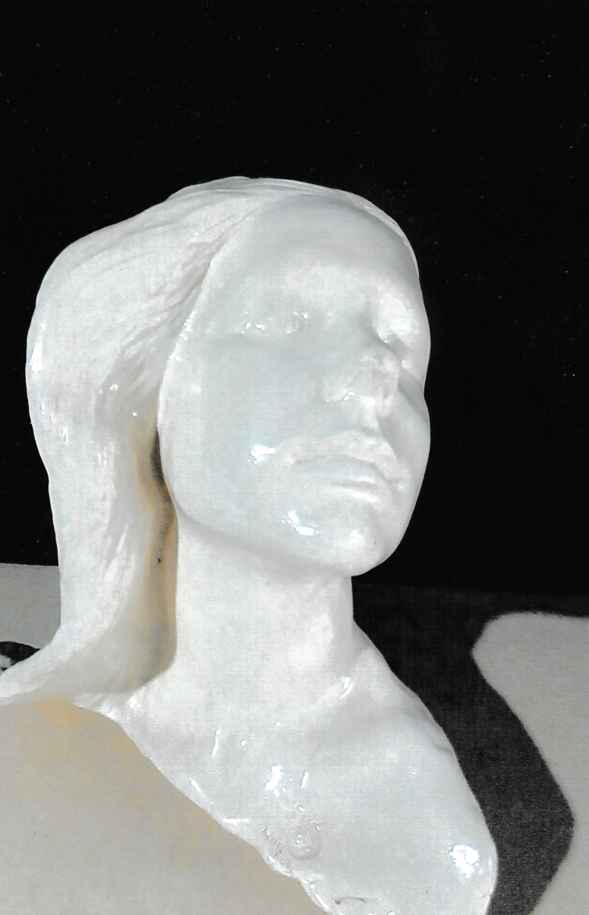 Ceramic life mask bust of a young woman with shoulder-length hair, her face tilted slightly upward and eyes softly closed.