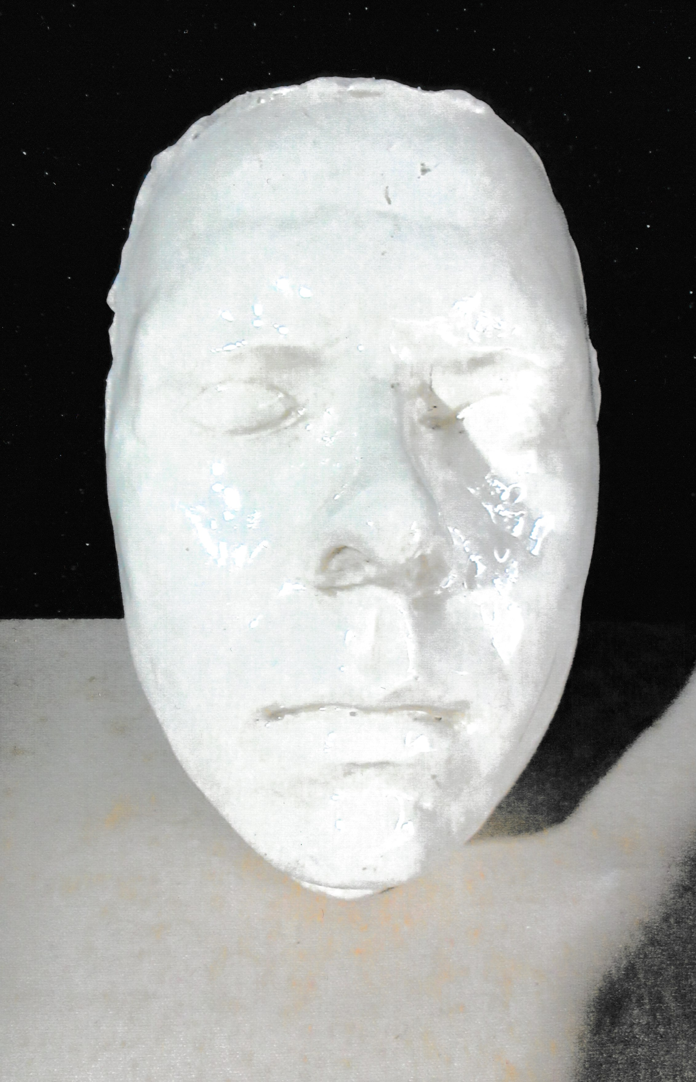 Ceramic life mask with closed eyes, showing subtle asymmetry and evidence of hand-finished craftsmanship.