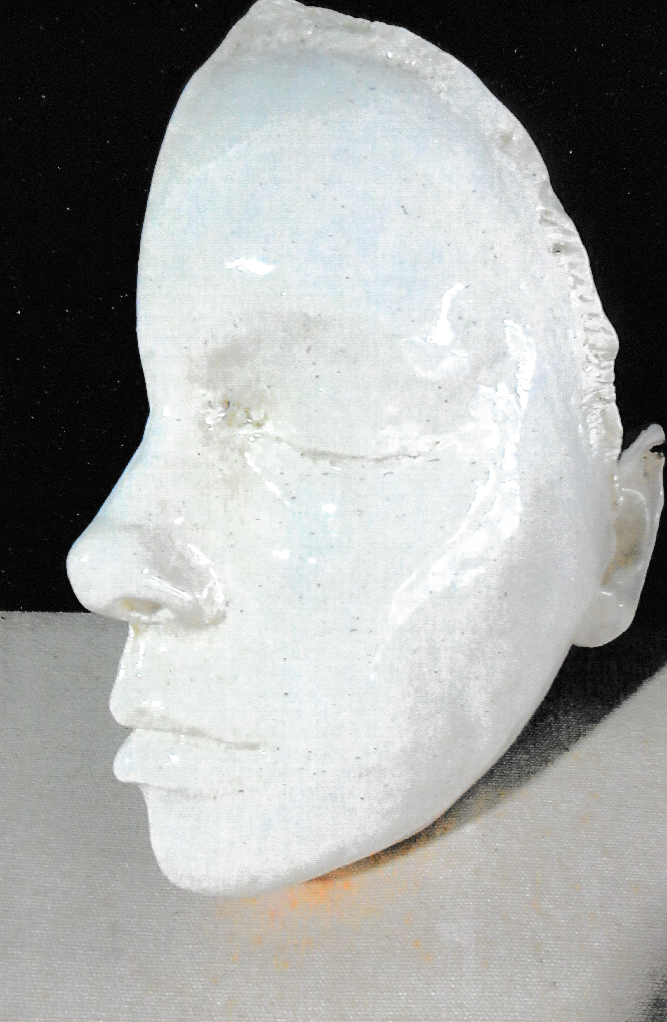 Large ceramic life mask shown in profile, emphasizing the elegant contours of the nose, lips, and brow.