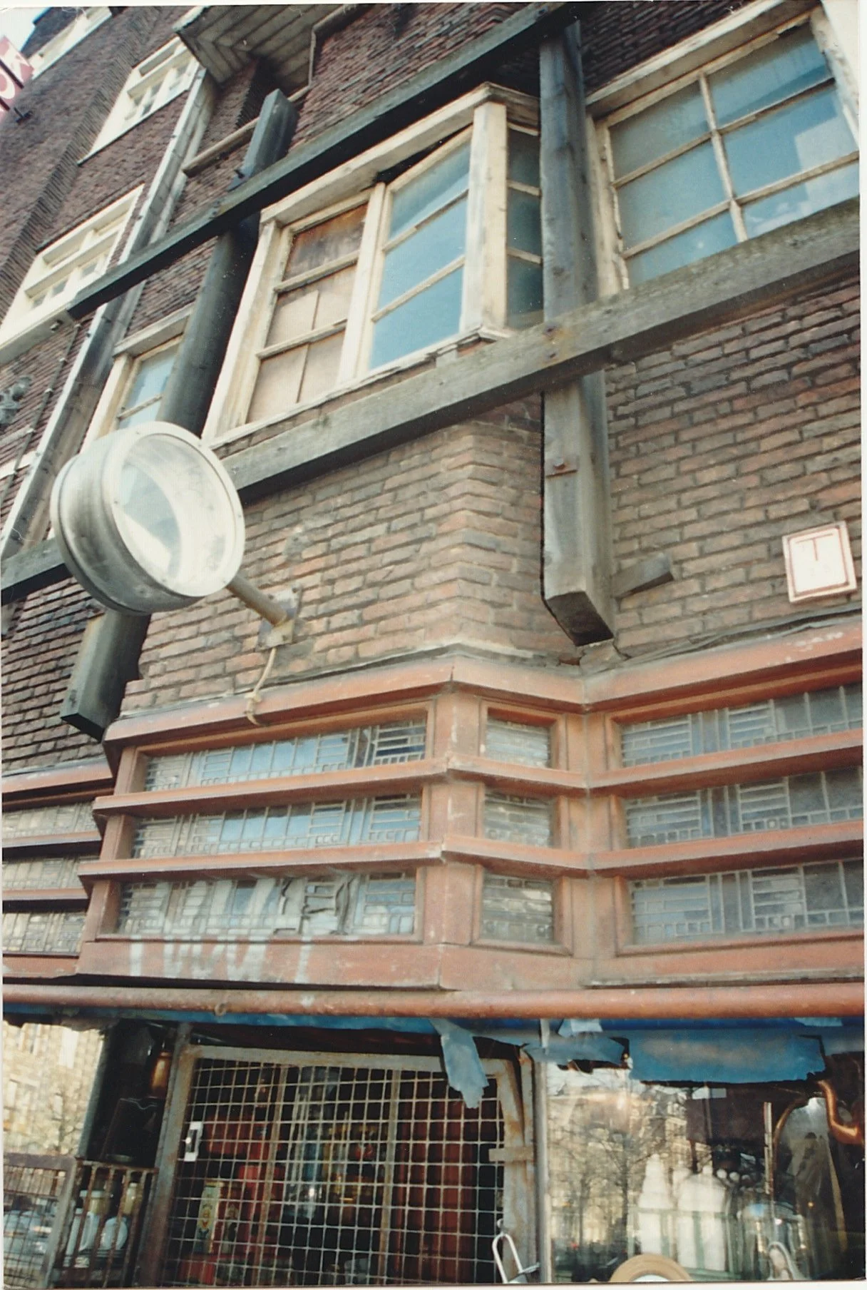 Historic storefront with decorative trim and upper-story windows.