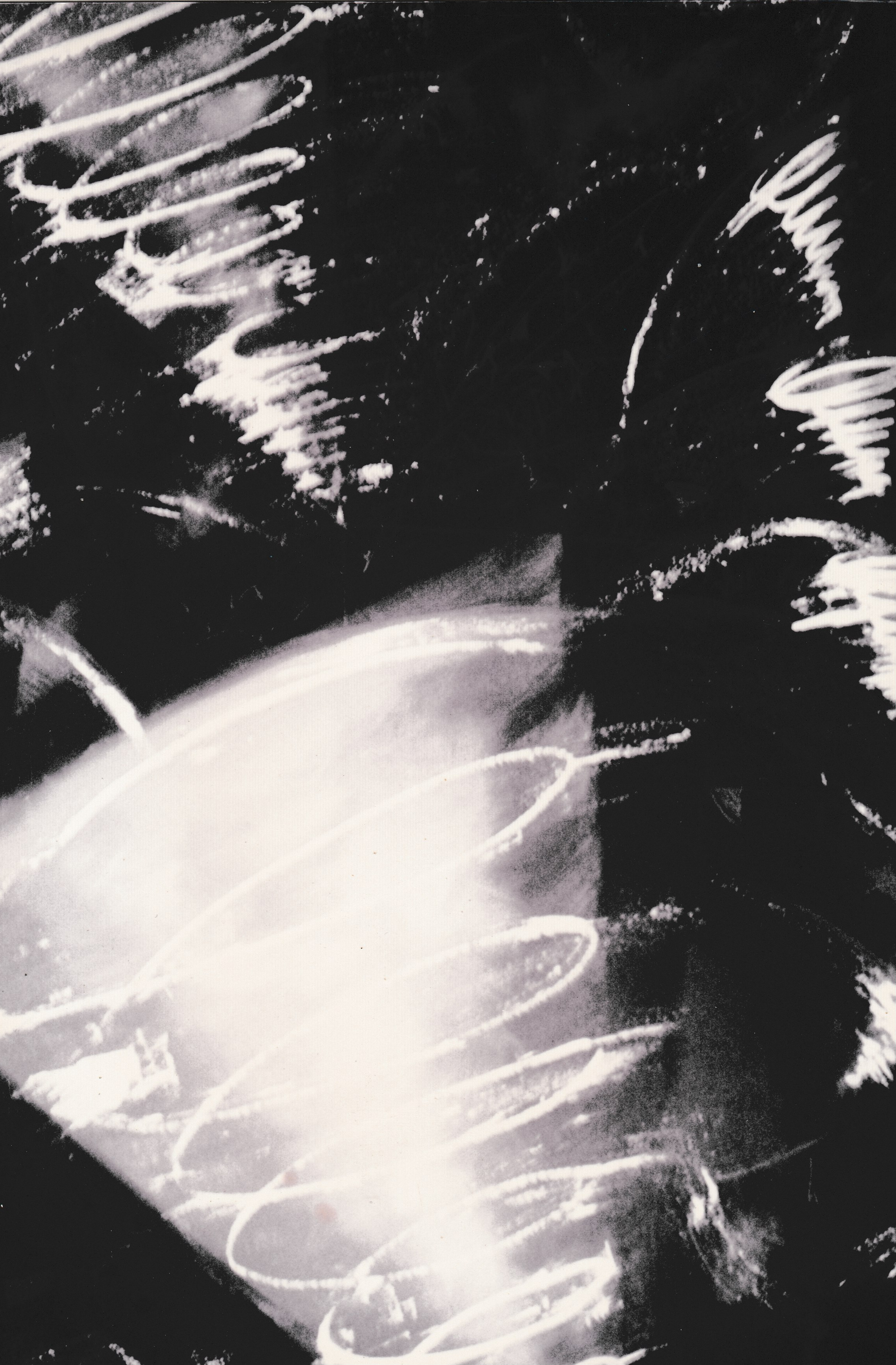 Black-and-white abstract composition with broad white sweeping strokes across a dark background.