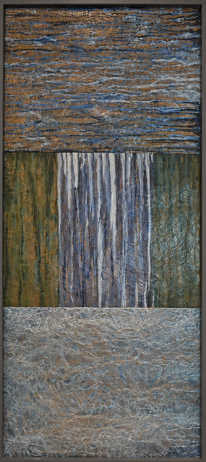 Layered bands of blue, green, and silver create an abstract metallic landscape. Shown close up in a gray frame.