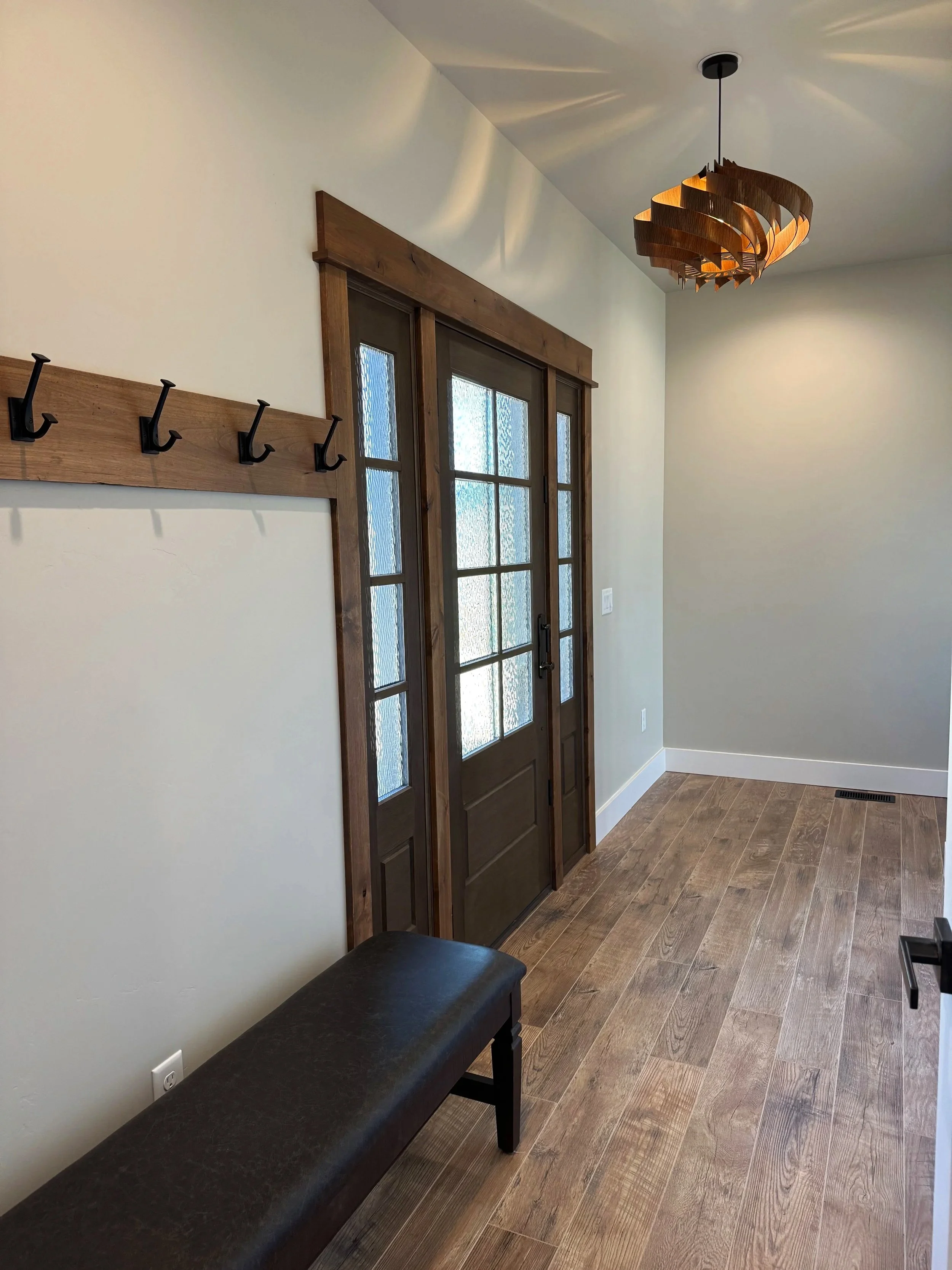 Custom  door detail with quality hardware and trim — precision craftsmanship by Mihelich Custom Builders near Butte, MT.