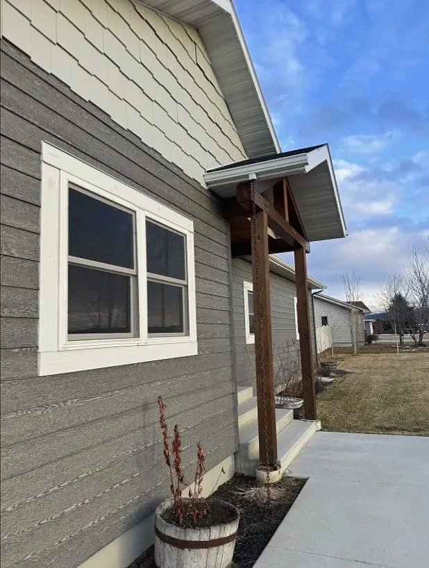 Custom home exterior detail with quality siding and craftsmanship — Mihelich Custom Builders, luxury custom home builder in Butte, MT.