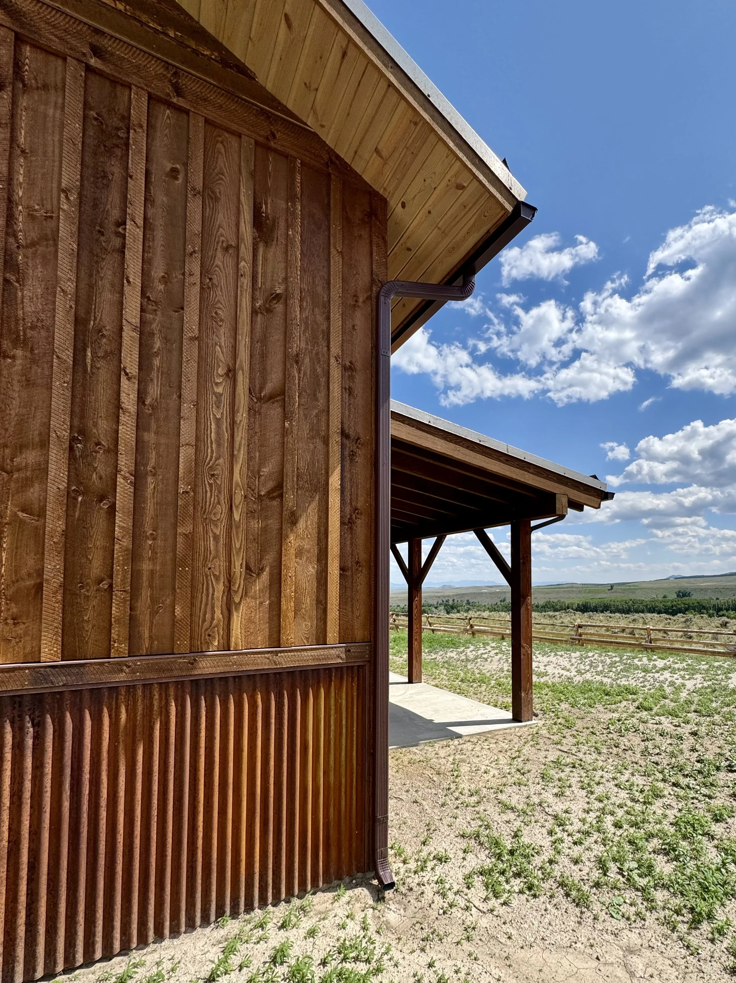 Custom natural wood siding detail — quality exterior craftsmanship by Mihelich Custom Builders, Glen, Montana.