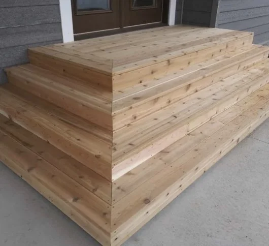 Custom wooden staircase — handcrafted detail by Mihelich Custom Builders, Butte, Montana.