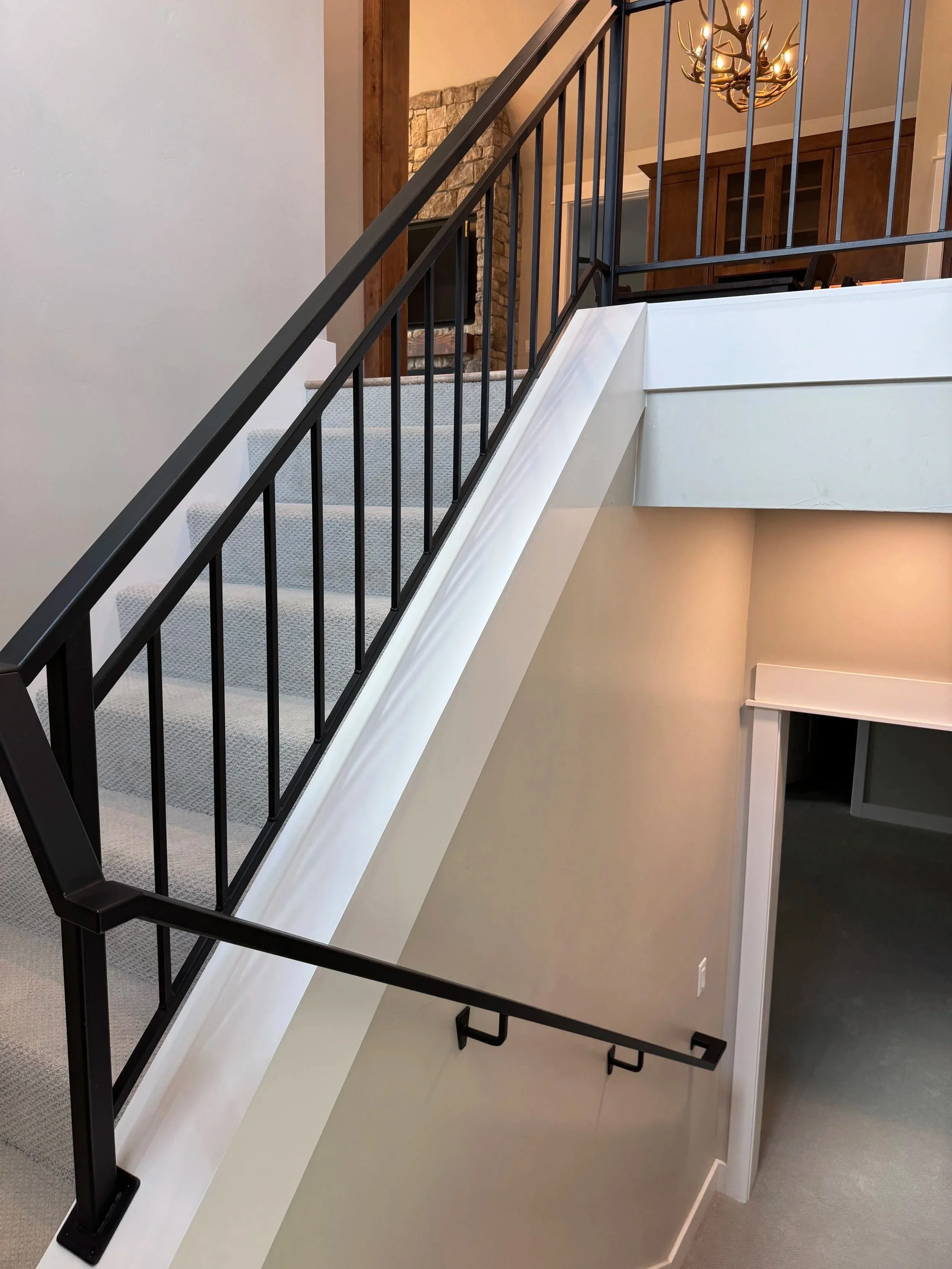 staircase with metal railing